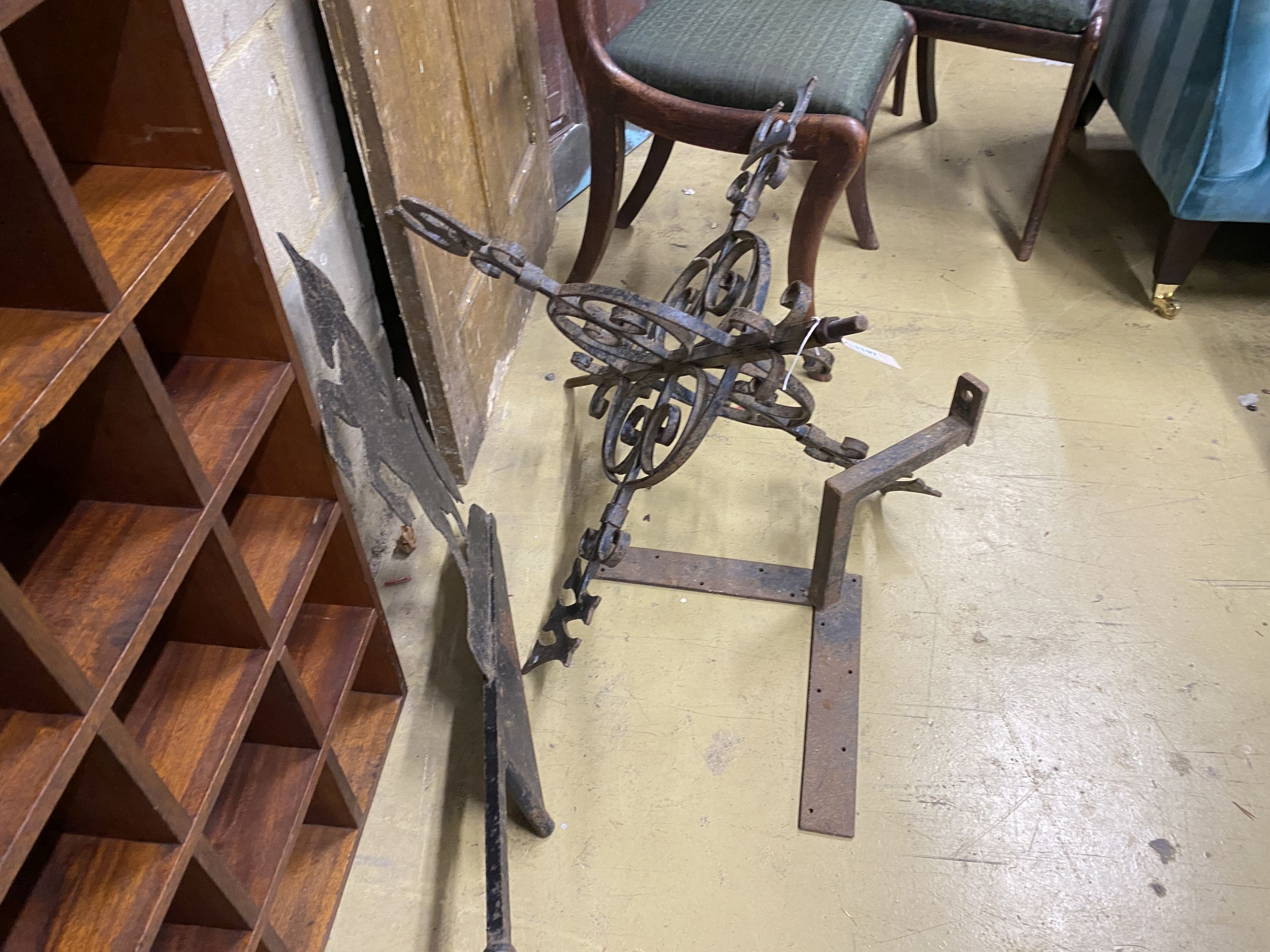 A wrought iron weather vane, width 90cm